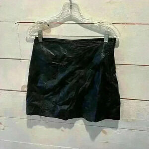 - Free People faux leather mini skirt, size 6, NWOT.